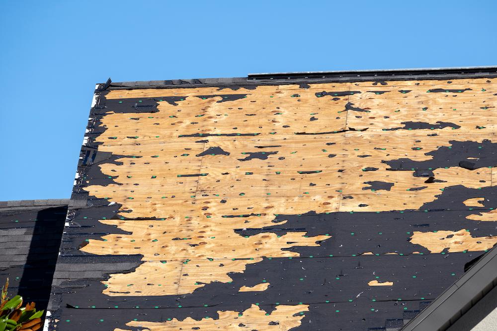 Get professional help from the Beard Roofing team for Hail Damage Noblesville image shows damaged roof