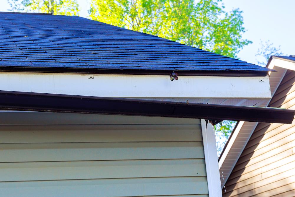 Install quality Westfield Gutters for your property with help from Beard Roofing & Exteriors image shows damaged gutter