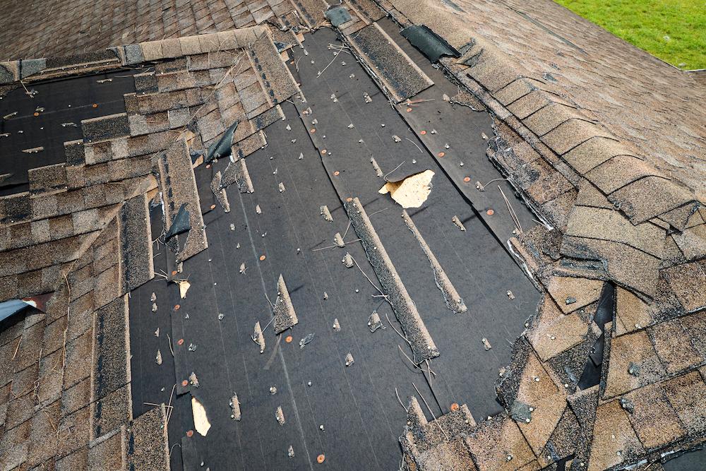 Work with the expert Beard Roofing team for Noblesville Roof Repair image shows damaged roof