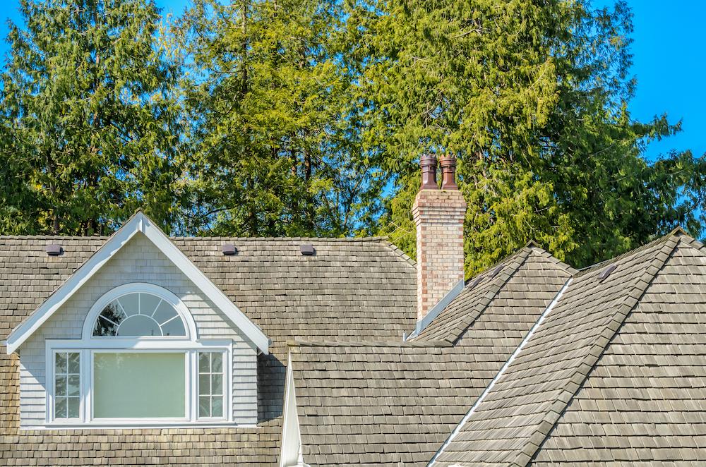 Work with Roofing Contractors Indianapolis homeowners trust at Beard Roofing & Exteriors image shows house with shingle roof