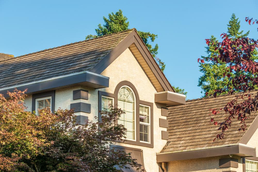 Contact Beard Roofing & Exteriors for Indianapolis Roofing expertise image shows house with brown shingles on roof