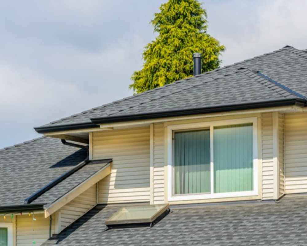 Work with Beard Roofing & Exteriors on your residential roofing needs image shows roof of suburban home